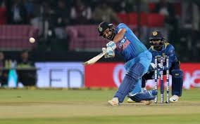 ROHIT-HITS-HUGE-SIX-ON-BUS-TOP